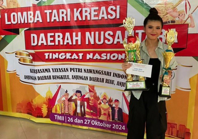 Milana dari kelas IX-4 meraih JUARA UMUM lomba tari kreasi daerah nusantara tingkat Nasional di TMII
